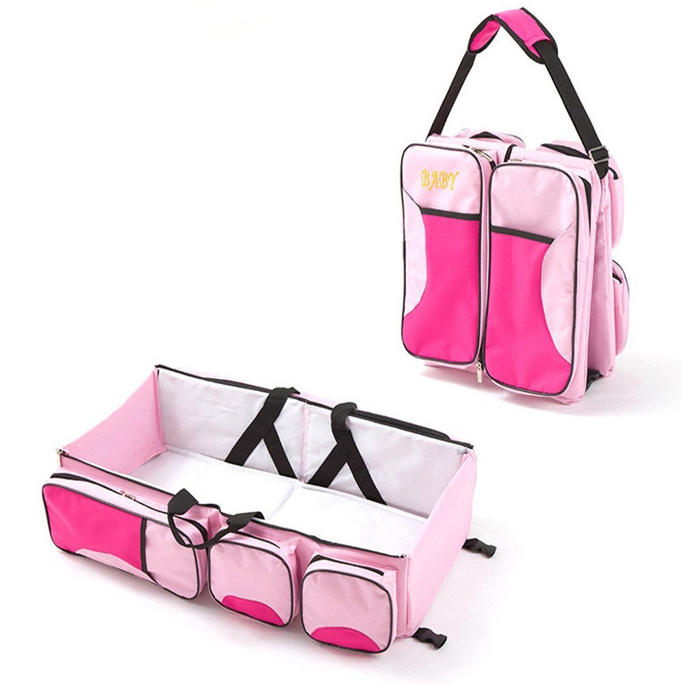Baby Folding Bed Mommy Bag with portable baby bed, large storage compartments, and comfortable shoulder straps for travel and everyday parenting