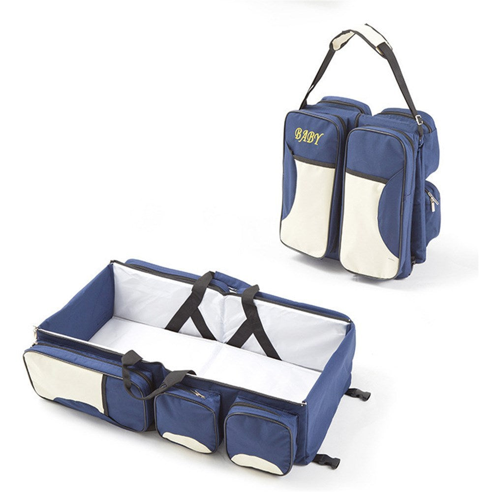 Baby Folding Bed Mommy Bag with portable baby bed, large storage compartments, and comfortable shoulder straps for travel and everyday parenting
