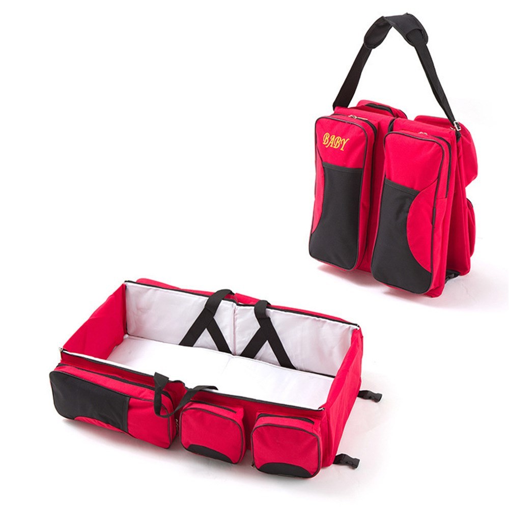 Baby Folding Bed Mommy Bag with portable baby bed, large storage compartments, and comfortable shoulder straps for travel and everyday parenting