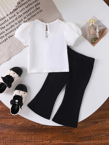 Europe  United States summer girl suit new temperament girl suit  child bubble sleeve short sleeve + micro pants two-piece set