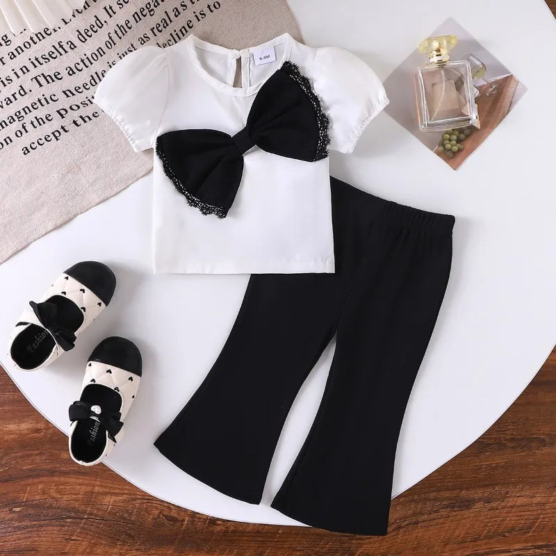 Europe  United States summer girl suit new temperament girl suit  child bubble sleeve short sleeve + micro pants two-piece set