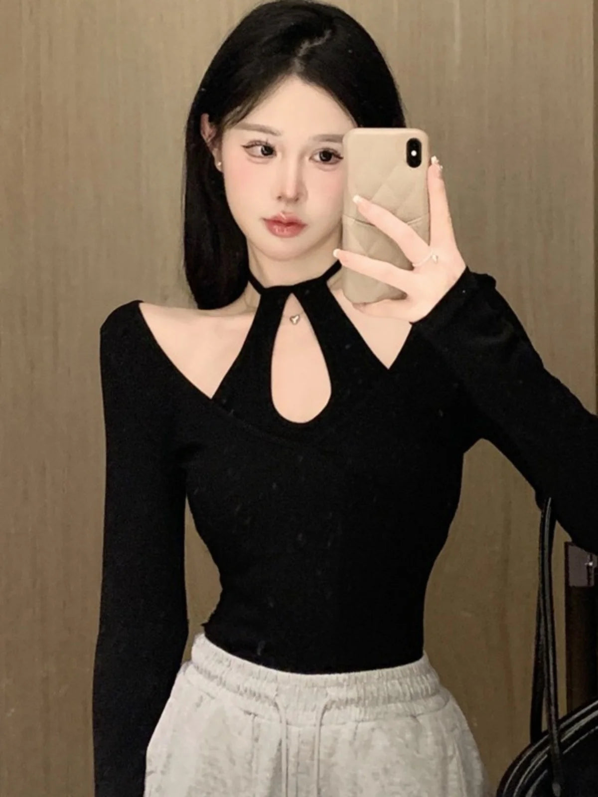 Sexy Spicy Girl Hollow out Long Sve Ne Hanging T-irt Women's Slimming Base irt Trendy Top Korean Sle round Ne