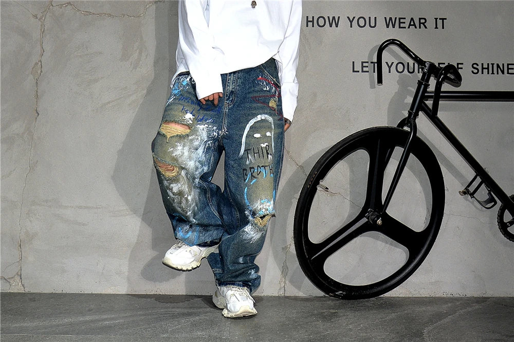 High End Men'S Clothing Hip Hop Graffiti Baggy Jeans For Men Streetwear Skateboard Ripped Jeans Korean Trendy Denim Trousers  ( Available )