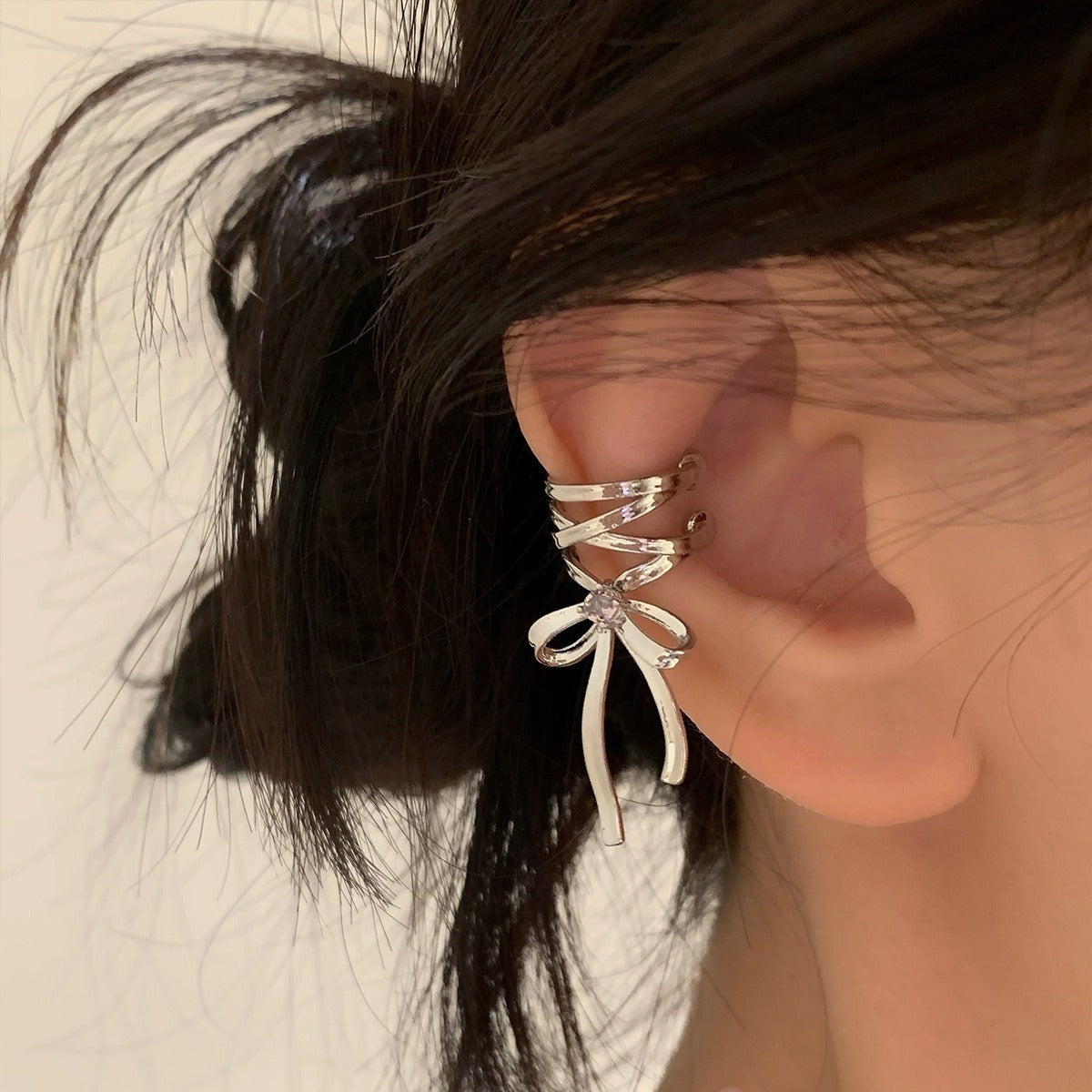 Ribbon bow ear cuff with a non-piercing ballet-inspired design for women, lightweight fashion jewelry for everyday wear and parties