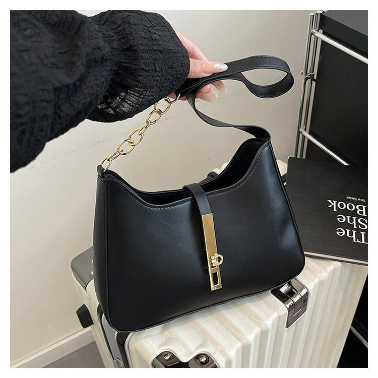 Korean Niche Design Bag for Women 2025 Summer New Texture Handheld Armpit Bag Versatile Fashion Shoulder Bag - black