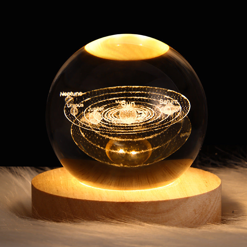 3D Galaxy Crystal Ball Night Light with USB wooden LED base featuring Moon, Saturn, Solar System, and Nebula designs for bedroom décor